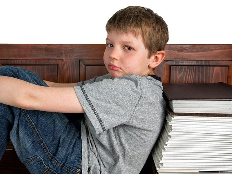 Enfant qui s'ennuie