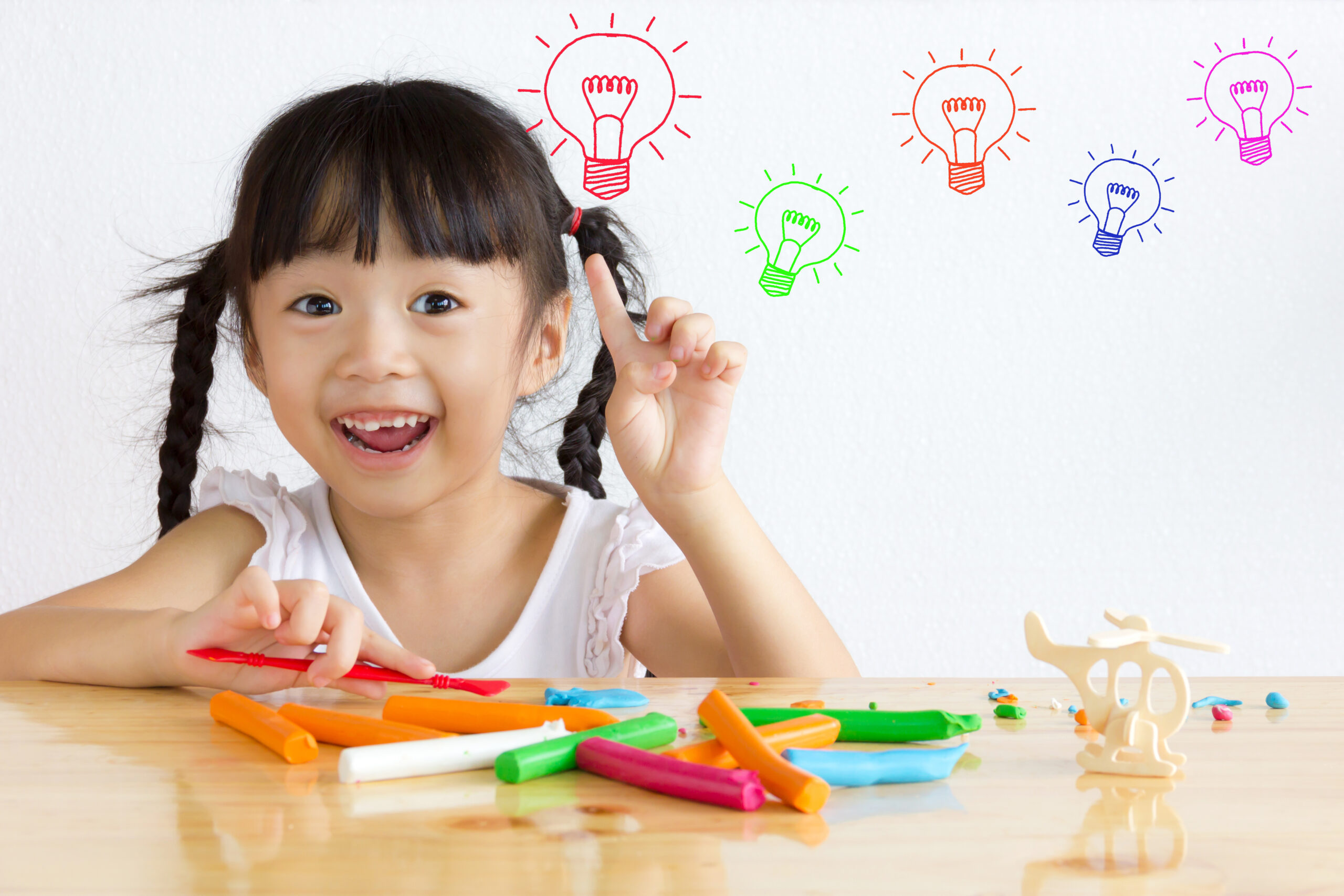 Asian,Girl,Are,Playing,Plasticine.,She,Has,New,Ideas.